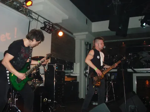 Guitarist and bass player during a performance.