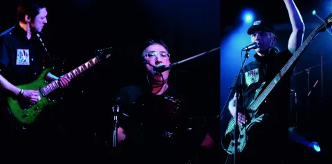 All three project members together on stage.